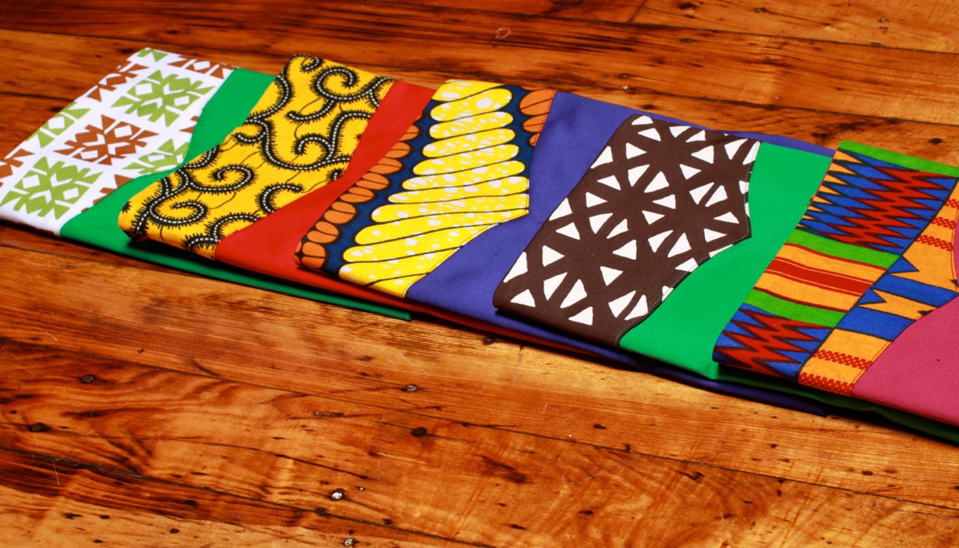 54 Kingdoms Afrikana Delight Skirts All Colors Wood Display